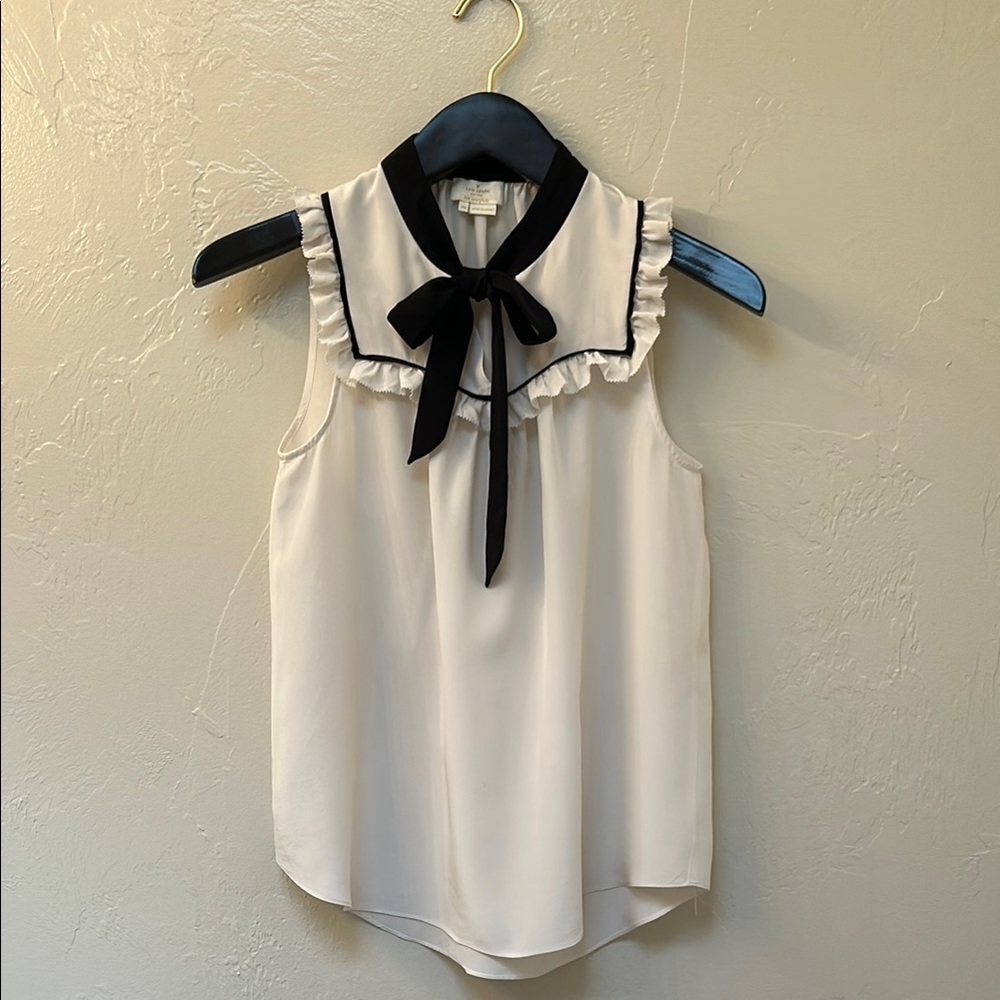 Elegant White Sleeveless Blouse with Black Trim